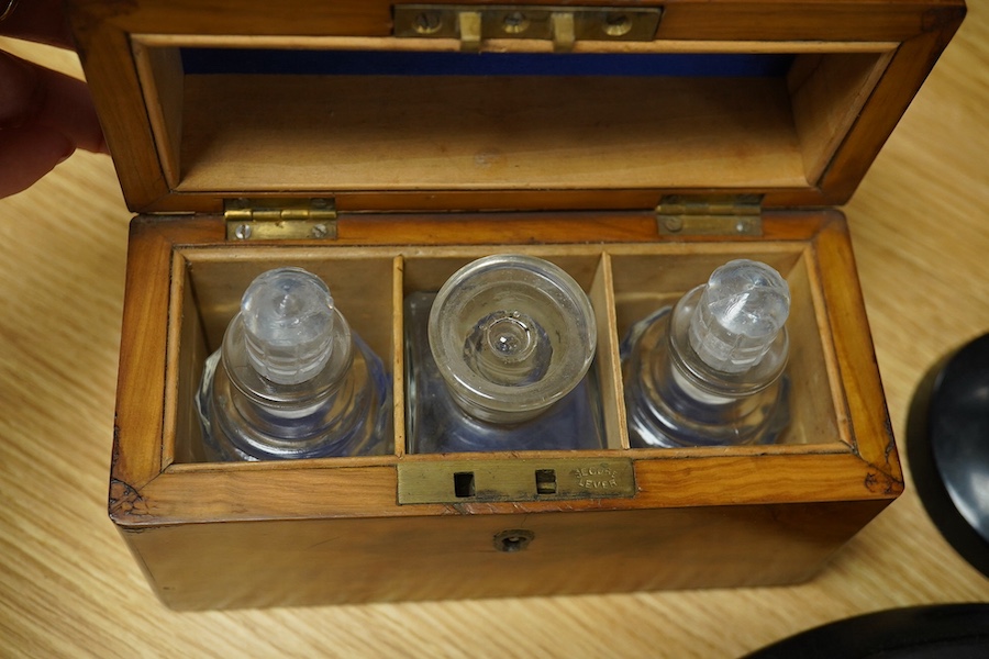 A yew wood domed box, an olivewood scent bottle box, a horn oval box and black circular mirror and two instruments, mirror 30cm diameter. Condition - fair to good